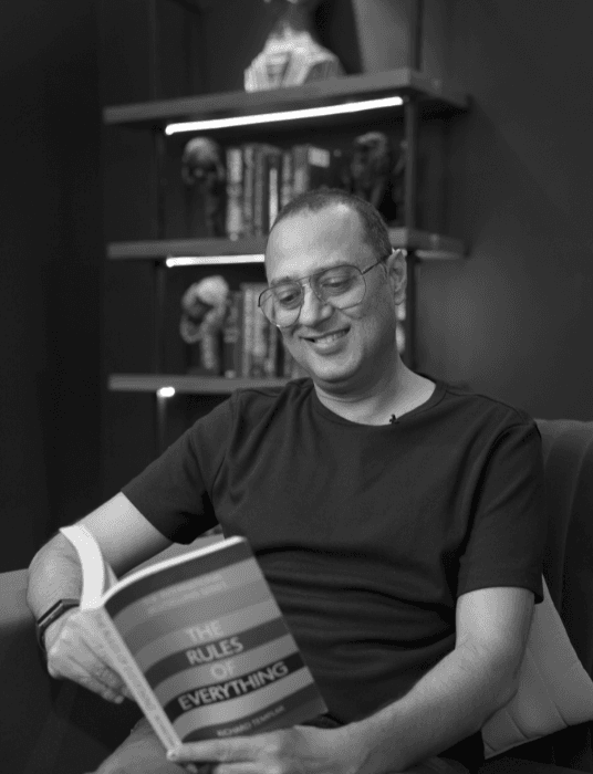 A meadow filled with colorful flowers under the blue sky